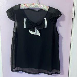 3/25$ Sheer blouse with bow